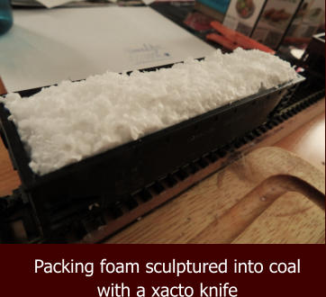 Packing foam sculptured into coal with a xacto knife